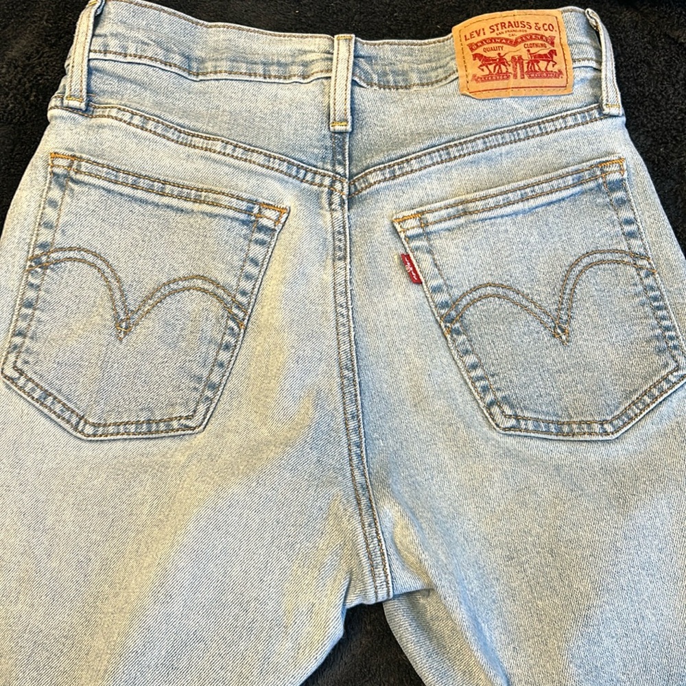Light blue button fly wedgie straight Levi’s